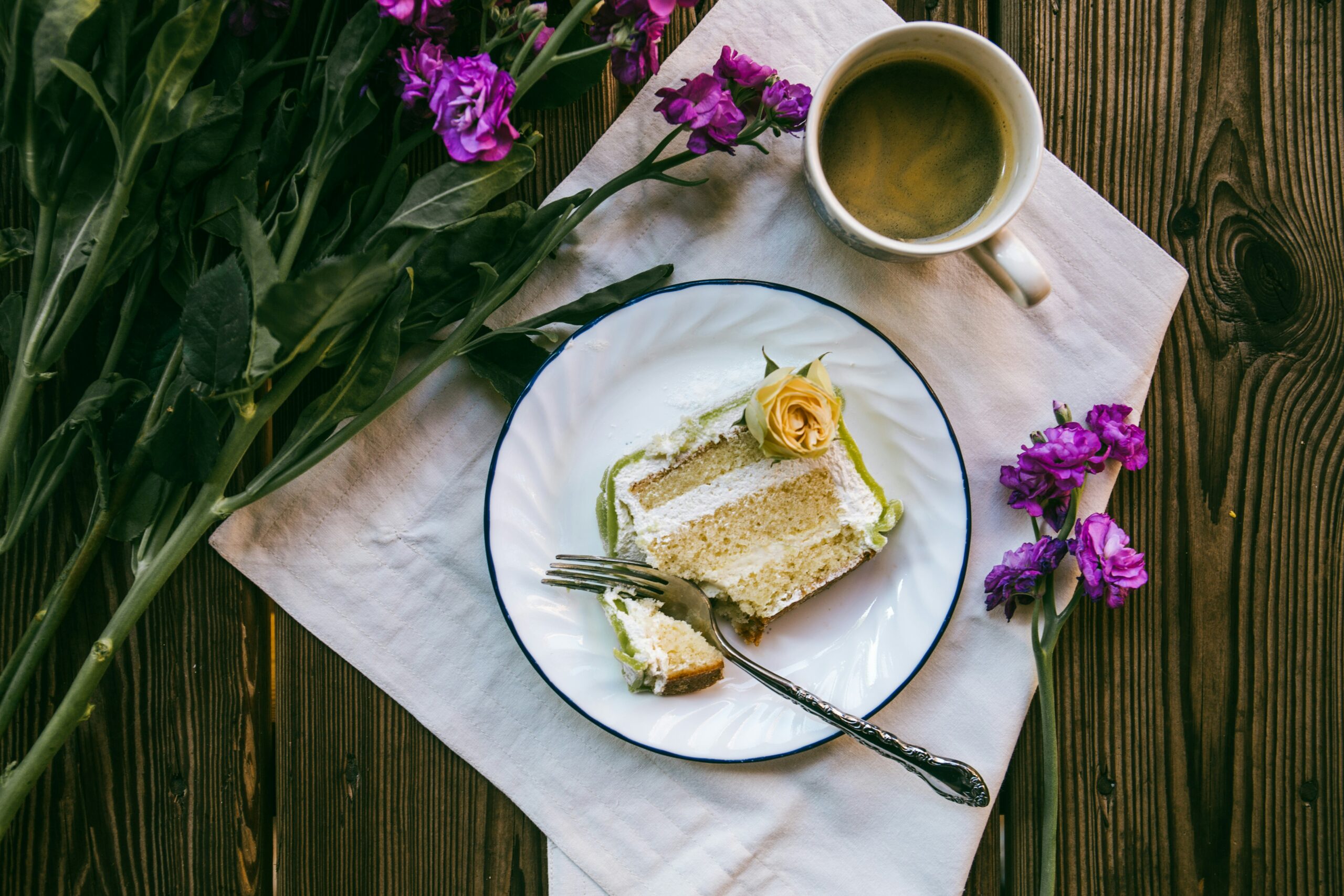 A Cake, Flowers, and Book Inspired Artwork